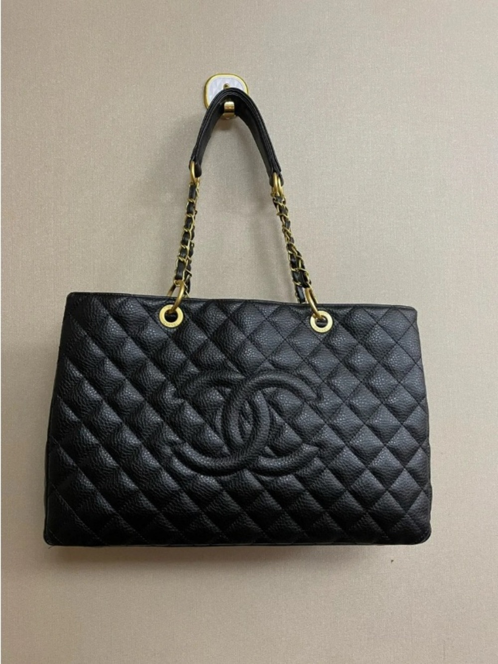 CHANEL Black Quilted Leather Shoulder Bag with Gold Chain Handles